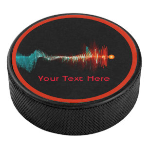 Deeltjesgolfdualiteit Hockey Puck