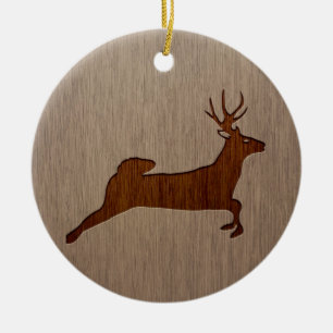 Deer silhouette gegraveerd op houtafbeelding keramisch ornament