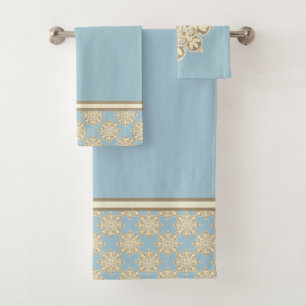 Dekdoekset met medailles op blauw bad handdoek