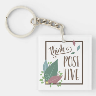 Denk aan positieve motivatie en veer boho sleutelhanger