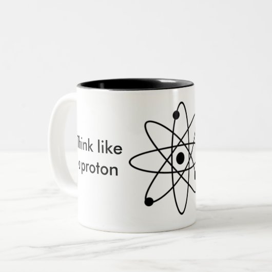 Denk als een proton en blijf positief! Mok (Voorkant links)