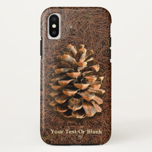 Dennenappel op gevallen naalden iPhone XS hoesje