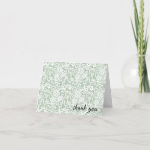 Dentelle blanche sur fond vert sauge Merci