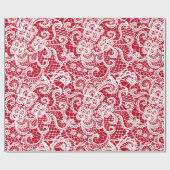 Dentelle blanche sur papier cadeau rouge (Plat)