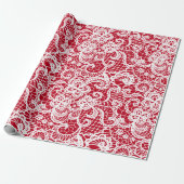 Dentelle blanche sur papier cadeau rouge (Déroulé)