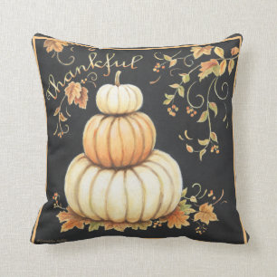 Des citrouilles chauds avec un coussin noir "Géni