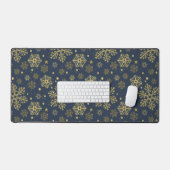 Des flocons de neige dorés sur du papier d'emballa (Clavier et souris)