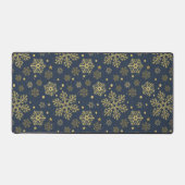 Des flocons de neige dorés sur du papier d'emballa (Recto)