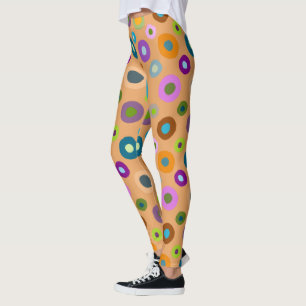 Des leggings amusants partout sur des points color