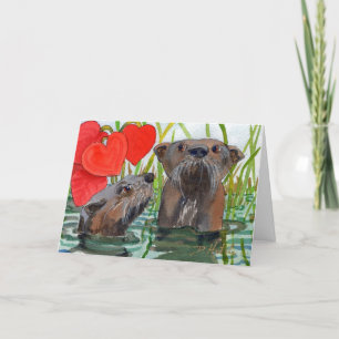 Des loutres. Une carte anniversaire pour les amate