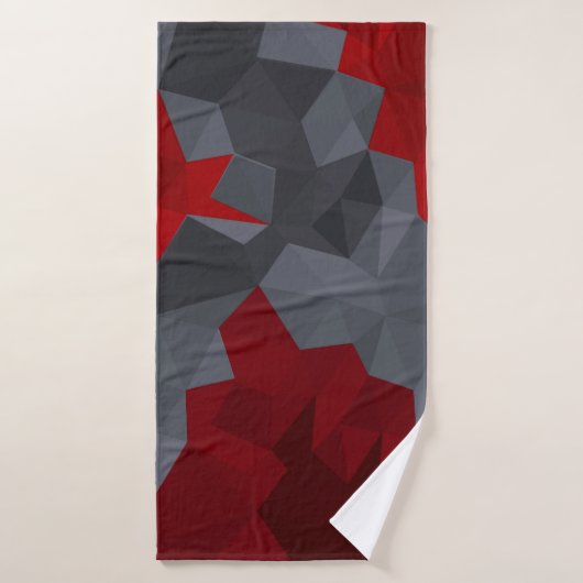 Des triangles gris, rouges disposés aléatoirement. (Serviette de bain)