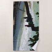 Des vêtements accrochés à un Serviette de plage d' (Devant)