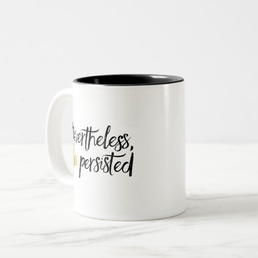 Desondanks bleef ze zwart en goud. tweekleurige koffiemok (Voorkant links)