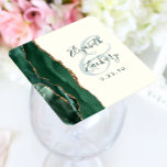 Dessous-de-verre Carré En Papier Agate Emerald Green Ivory Gold Script Wedding<br><div class="desc">This elegant modern wedding coaster features an emerald green watercolor agate geode design trimmed with faux gold glitter. Easily customize the green text on an ivory background,  with the names of the bride and groom in handwriting calligraphy over a large ampersand.</div>