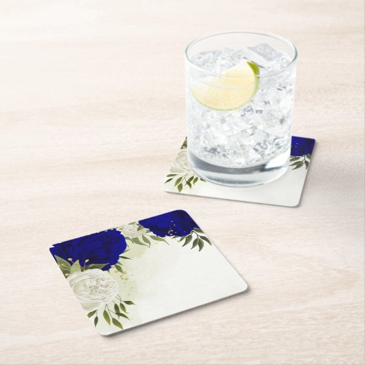 Dessous-de-verre Carré En Papier bleu royal et fleurs blanches mariage (En situation)