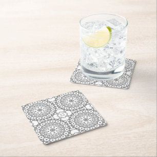 Dessous-de-verre Carré En Papier Carrés blancs dentés sur un arrière - plan gris cl