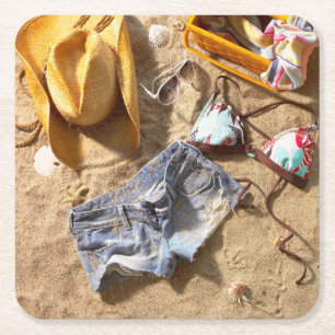 Dessous-de-verre Carré En Papier Habillement laissé sur la plage