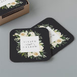 Dessous-de-verre Carré En Papier Ivory Bloom | Mariage de cadre floral personnalisé<br><div class="desc">Notre collection de fleurs d'ivoire à mariage florale présente une verdure d'aquarelle délicatement peinte,  un feuillage d'eucalyptus,  un feuillage botanique vert et des fleurs de pivoines blanches et d'ivoire. Personnalisez ces dessous de verre personnalisés avec vos noms,  unis par un accent de script décoratif.</div>