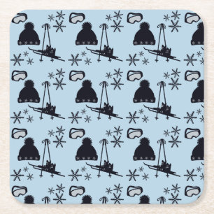 Dessous-de-verre Carré En Papier Matériel de ski noir et flocons de neige sur bleu