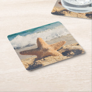 Dessous-de-verre Carré En Papier Starfish sur une plage de sable Photo