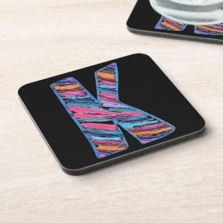 Dessous-de-verre Colorful Multicolored Letter K as in Kay on Black