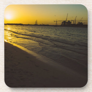 Dessous-de-verre coucher de soleil sur la plage de Dubaï