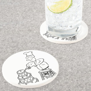 Dessous De Verre En Grès Décorateur de gâteaux décorant un gâteau géant