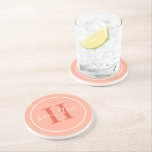 Dessous De Verre En Grès Élégant Coral Orange Personnalisé Monogramme Initi<br><div class="desc">Elégant rond personnalisé boisson design dessous de verre dispose d'un classique serif monogramme personnalisé initiale en orange rouge avec votre nom de famille dans script de calligraphie blanc moderne contre un arrière - plan corail / rose pêche. Un simple cercle blanc encadre le design. Le jeu de couleurs peut être...</div>