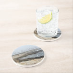 Dessous De Verre En Grès Morro Bay California Ocean Photography<br><div class="desc">A foggy overcast day in Morro Bay California with the ocean waves hitting the rocks on the shore in this beach photograph souvenir. This seaside travel photo keepsake coaster gift features black cursive script above the beach rocks and grey sky.</div>