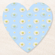 Motif de marguerite blanche sur le coeur bleu clai