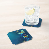 Dessous-de-verre En Papier Papillons d'or sur un Arrière - plan bleu (En situation)