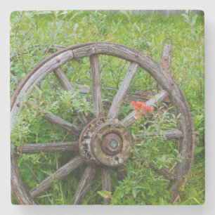 Dessous-de-verre En Pierre Ancienne roue de chariot dans l'historique vieille