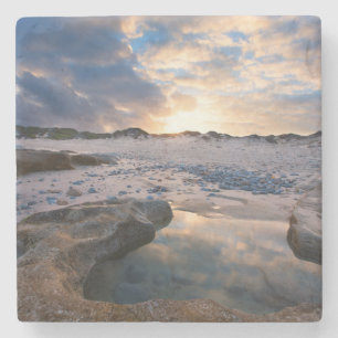 Dessous-de-verre En Pierre Au coucher du soleil dans un magma