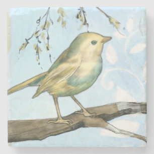 Dessous-de-verre En Pierre Le petit oiseau jaune était perché sur une branche