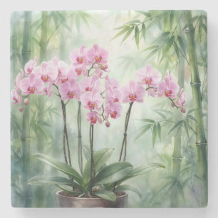 Dessous-de-verre En Pierre Plante d'orchidée rose sur fond de bambou