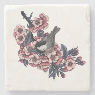 Dessous-de-verre En Pierre Poulet sur une branche de cerise en fleurs
