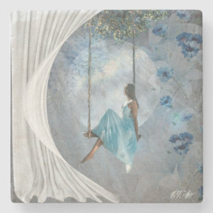 Dessous-de-verre En Pierre Une femme en robe bleue sur un swing