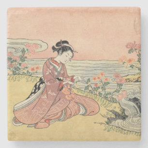Dessous-de-verre En Pierre Une femme qui ramasse des chrysanthèmes