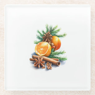 Dessous-de-verre En Verre Oranges avec Cloches et cannelle à côté de Fir Lea