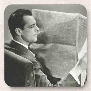 Dessous-de-verre Homme d'affaires lisant le journal