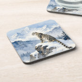 Dessous-de-verre Un léopard des neiges sur un pic enneigé (Côté gauche)