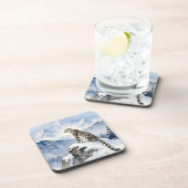 Dessous-de-verre Un léopard des neiges sur un pic enneigé (Côté Droit)