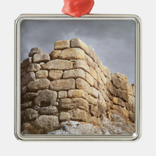 Detail van een stenen muur metalen ornament