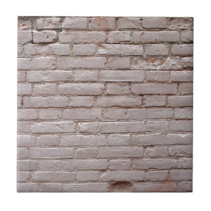 Detail van een wand van de oude beige kleibrikette tegeltje
