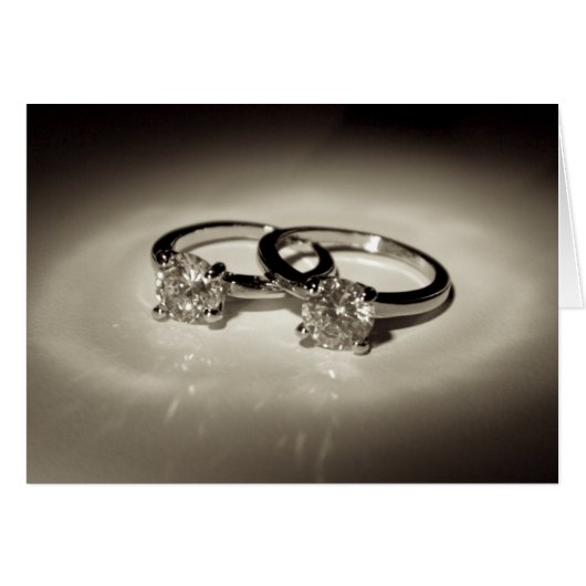 Deux anneaux de solitaire (Devant horizontal)