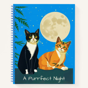 Deux chats sous le journal de la Pleine lune