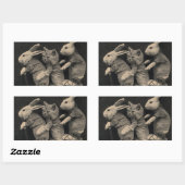 Deux lapins et un chat sur un scooter Sticker (Feuille)