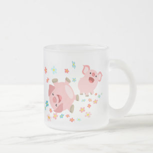 Deux mignons cochons de caricature dans la Mug déc