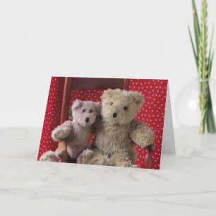 deux nounours dans une chaise rouge carte de voeux