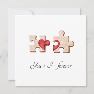 deux pièces de puzzle assorties avec une carte à c